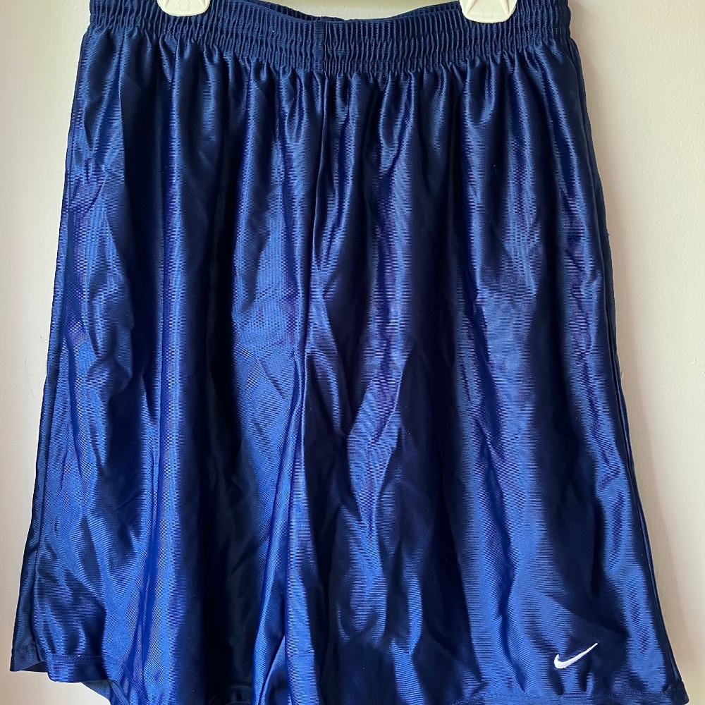 Men’s sports shorts and 3 t- shirts  Nike and Under Armour / Nike  in Large